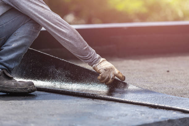 Professional Basement Waterproofing technician working in Erie, PA